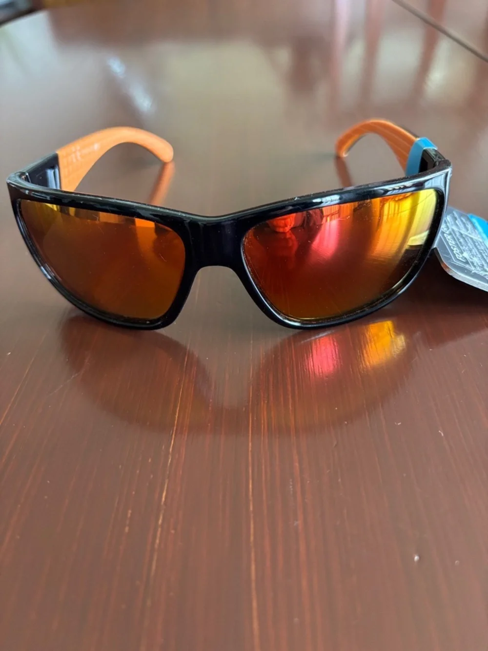 Foster Grant 100% UVA-UVB protect,black frame,rainbow mirror lens, rubber temple